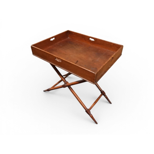 2044 - A 19TH CENTURY MAHOGANY BUTLERS TRAY ON STAND&nbsp;rectangular tray with shaped gallery with pierced... 
