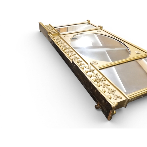 2045 - A 19TH CENTURY GILT GESSO TRIPLE PLATE OVERMANTLE MIRRORwith&nbsp;inverted breakfront cavetto ball c... 