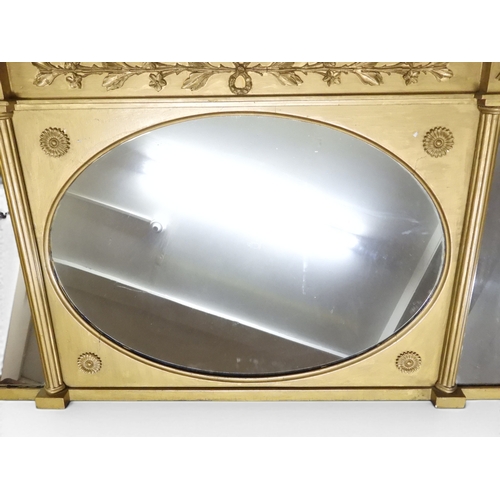 2045 - A 19TH CENTURY GILT GESSO TRIPLE PLATE OVERMANTLE MIRRORwith&nbsp;inverted breakfront cavetto ball c... 