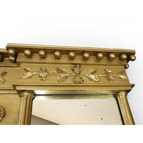 2045 - A 19TH CENTURY GILT GESSO TRIPLE PLATE OVERMANTLE MIRRORwith&nbsp;inverted breakfront cavetto ball c... 
