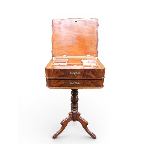 2047 - A VICTORIAN MAHOGANY SEWING WORK TABLE&nbsp;with hinged shaped top concealing fitted interior with l... 