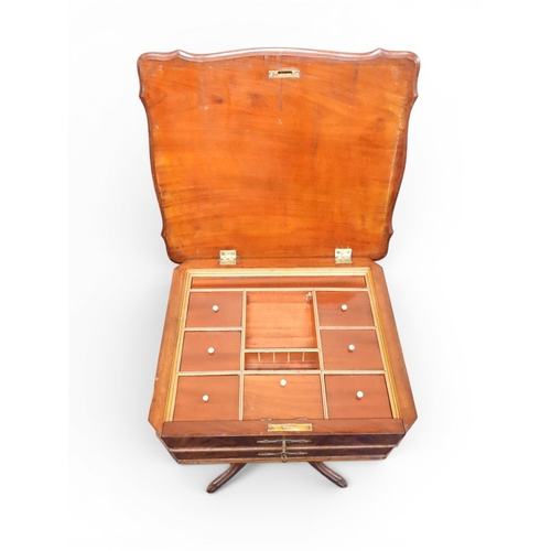 2047 - A VICTORIAN MAHOGANY SEWING WORK TABLE&nbsp;with hinged shaped top concealing fitted interior with l... 