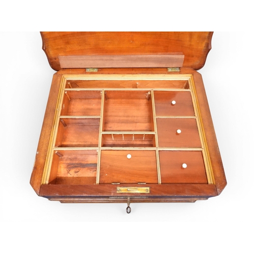 2047 - A VICTORIAN MAHOGANY SEWING WORK TABLE&nbsp;with hinged shaped top concealing fitted interior with l... 