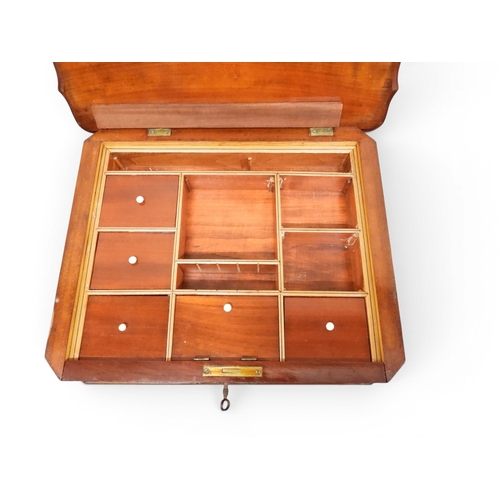 2047 - A VICTORIAN MAHOGANY SEWING WORK TABLE&nbsp;with hinged shaped top concealing fitted interior with l... 