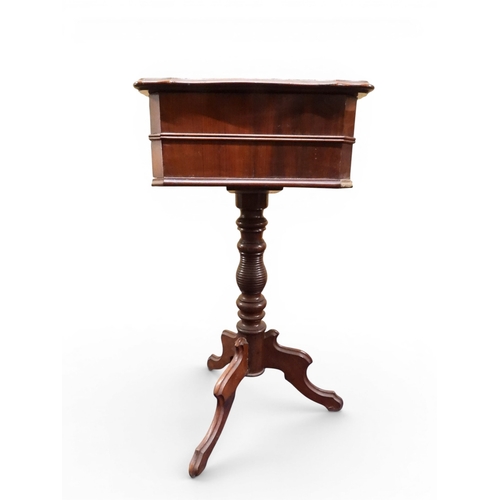 2047 - A VICTORIAN MAHOGANY SEWING WORK TABLE&nbsp;with hinged shaped top concealing fitted interior with l... 
