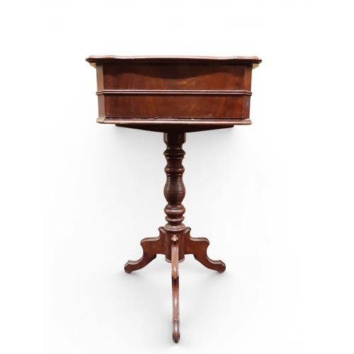 2047 - A VICTORIAN MAHOGANY SEWING WORK TABLE&nbsp;with hinged shaped top concealing fitted interior with l... 