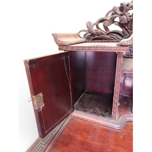 2048 - A MEIJI PERIOD JAPANESE HARDWOOD WRITING DESK AND CHAIRwith elaborately floral carved/pierced supers... 