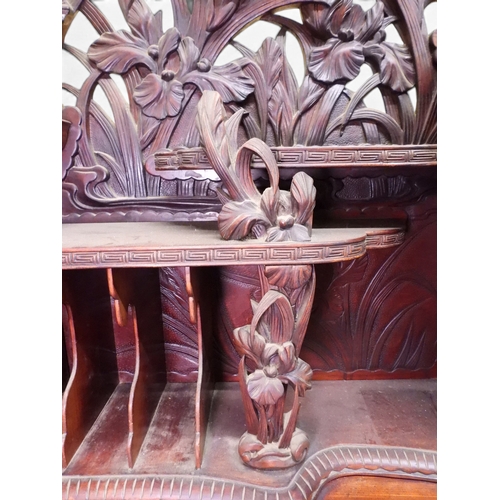 2048 - A MEIJI PERIOD JAPANESE HARDWOOD WRITING DESK AND CHAIRwith elaborately floral carved/pierced supers... 