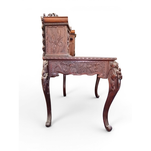 2048 - A MEIJI PERIOD JAPANESE HARDWOOD WRITING DESK AND CHAIRwith elaborately floral carved/pierced supers... 