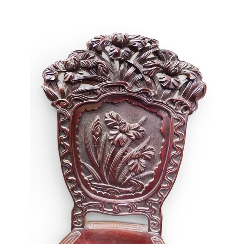 2048 - A MEIJI PERIOD JAPANESE HARDWOOD WRITING DESK AND CHAIRwith elaborately floral carved/pierced supers... 