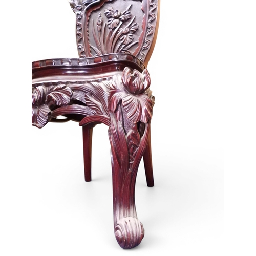 2048 - A MEIJI PERIOD JAPANESE HARDWOOD WRITING DESK AND CHAIRwith elaborately floral carved/pierced supers... 