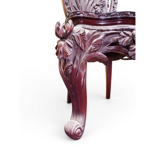 2048 - A MEIJI PERIOD JAPANESE HARDWOOD WRITING DESK AND CHAIRwith elaborately floral carved/pierced supers... 