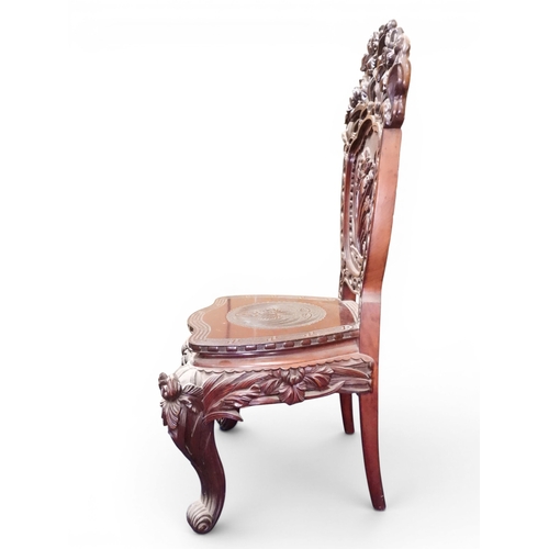 2048 - A MEIJI PERIOD JAPANESE HARDWOOD WRITING DESK AND CHAIRwith elaborately floral carved/pierced supers... 