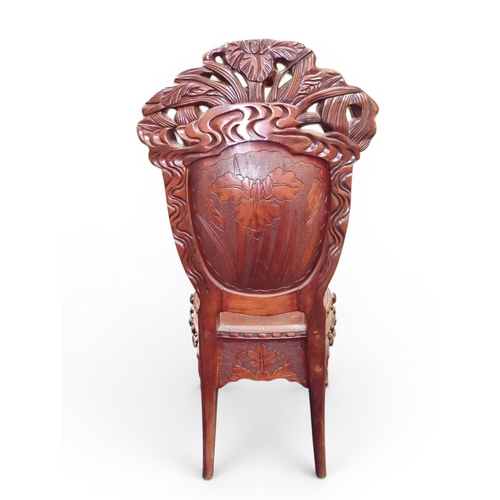 2048 - A MEIJI PERIOD JAPANESE HARDWOOD WRITING DESK AND CHAIRwith elaborately floral carved/pierced supers... 