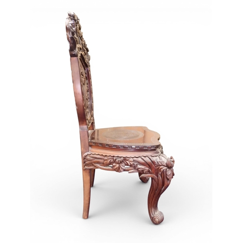 2048 - A MEIJI PERIOD JAPANESE HARDWOOD WRITING DESK AND CHAIRwith elaborately floral carved/pierced supers... 