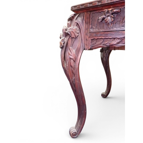 2048 - A MEIJI PERIOD JAPANESE HARDWOOD WRITING DESK AND CHAIRwith elaborately floral carved/pierced supers... 