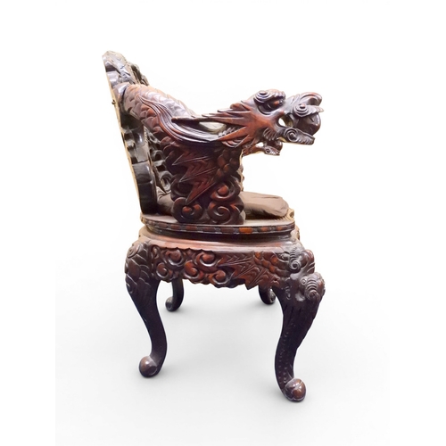 2049 - A MEIJI ERA JAPANESE HARDWOOD TUB ARMCHAIR&nbsp;with elaborately carved/pierced dragon backrest over... 