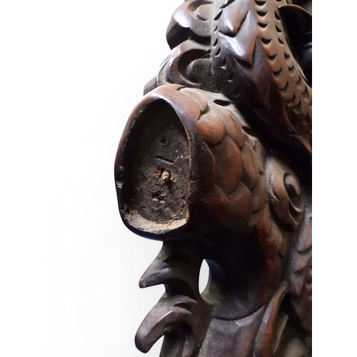 2049 - A MEIJI ERA JAPANESE HARDWOOD TUB ARMCHAIR&nbsp;with elaborately carved/pierced dragon backrest over... 
