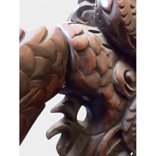 2049 - A MEIJI ERA JAPANESE HARDWOOD TUB ARMCHAIR&nbsp;with elaborately carved/pierced dragon backrest over... 