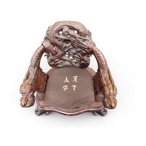 2049 - A MEIJI ERA JAPANESE HARDWOOD TUB ARMCHAIR&nbsp;with elaborately carved/pierced dragon backrest over... 