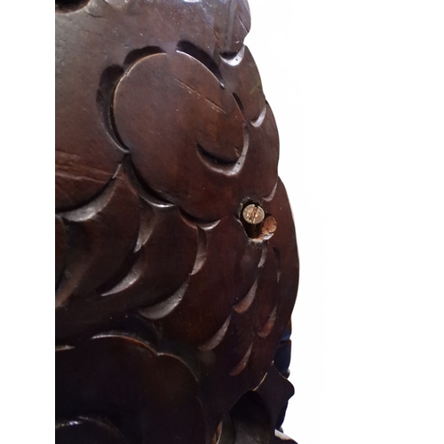 2049 - A MEIJI ERA JAPANESE HARDWOOD TUB ARMCHAIR&nbsp;with elaborately carved/pierced dragon backrest over... 