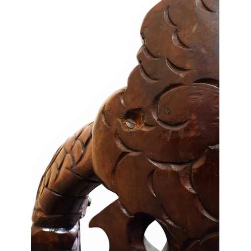 2049 - A MEIJI ERA JAPANESE HARDWOOD TUB ARMCHAIR&nbsp;with elaborately carved/pierced dragon backrest over... 