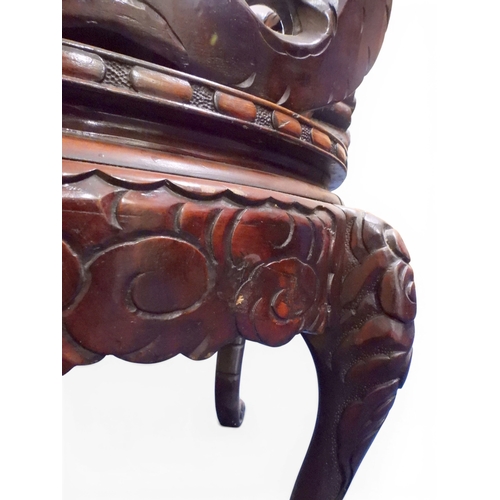 2049 - A MEIJI ERA JAPANESE HARDWOOD TUB ARMCHAIR&nbsp;with elaborately carved/pierced dragon backrest over... 