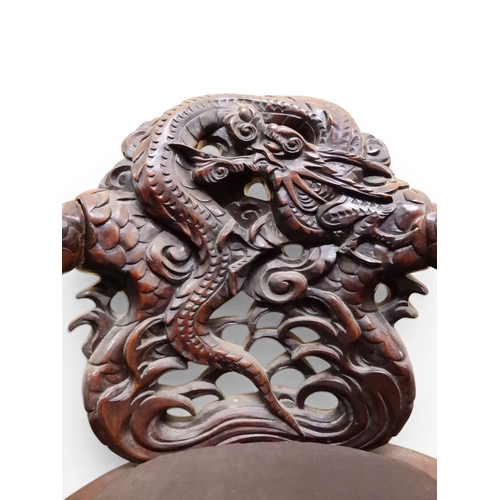2049 - A MEIJI ERA JAPANESE HARDWOOD TUB ARMCHAIR&nbsp;with elaborately carved/pierced dragon backrest over... 