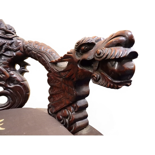 2049 - A MEIJI ERA JAPANESE HARDWOOD TUB ARMCHAIR&nbsp;with elaborately carved/pierced dragon backrest over... 
