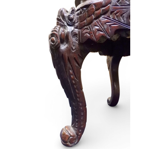 2049 - A MEIJI ERA JAPANESE HARDWOOD TUB ARMCHAIR&nbsp;with elaborately carved/pierced dragon backrest over... 