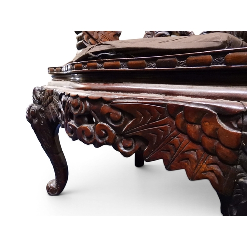 2049 - A MEIJI ERA JAPANESE HARDWOOD TUB ARMCHAIR&nbsp;with elaborately carved/pierced dragon backrest over... 