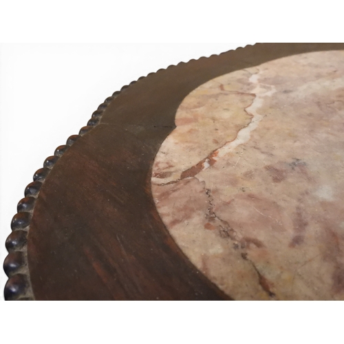 2050 - A 19TH CENTURY CHINESE HARDWOOD JARDINIERE STAND&nbsp;shaped marble inset top over carved pierced fr... 