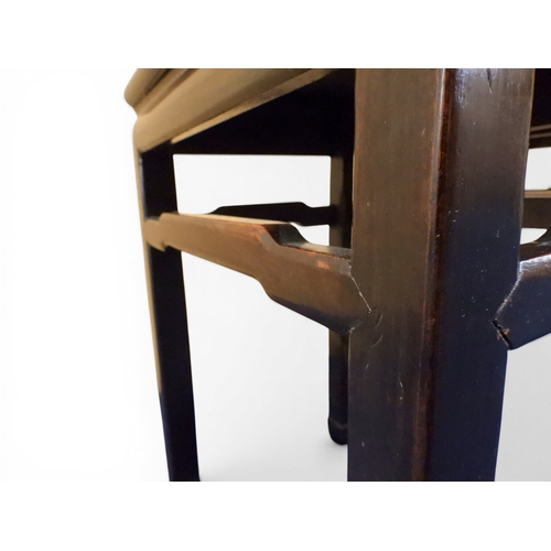 2052 - A PAIR OF 19TH CENTURY CHINESE HARDWOOD LOW TABLES with plain rectangular tops on square shaped supp... 