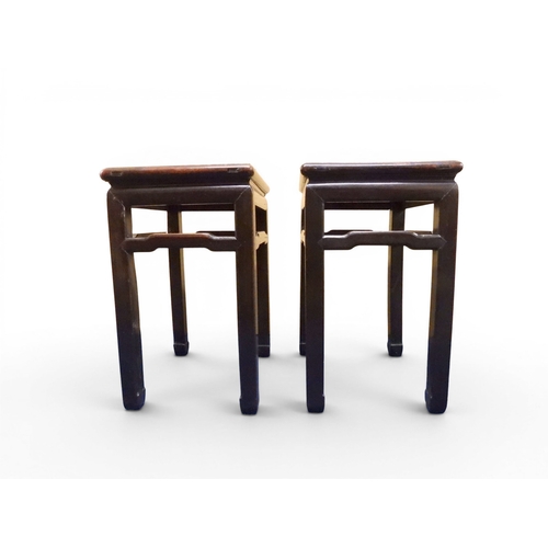 2052 - A PAIR OF 19TH CENTURY CHINESE HARDWOOD LOW TABLES with plain rectangular tops on square shaped supp... 