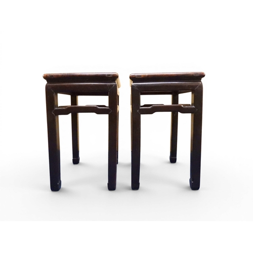 2052 - A PAIR OF 19TH CENTURY CHINESE HARDWOOD LOW TABLES with plain rectangular tops on square shaped supp... 