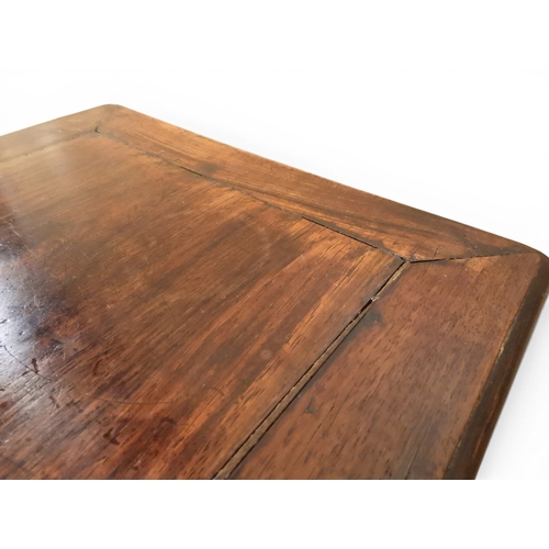 2052 - A PAIR OF 19TH CENTURY CHINESE HARDWOOD LOW TABLES with plain rectangular tops on square shaped supp... 