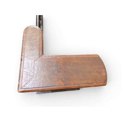 2056 - A LARGE 19TH CENTURY WROUGHT IRON CLUB FENDERwith oak topped seats to corners over twisted square ra... 