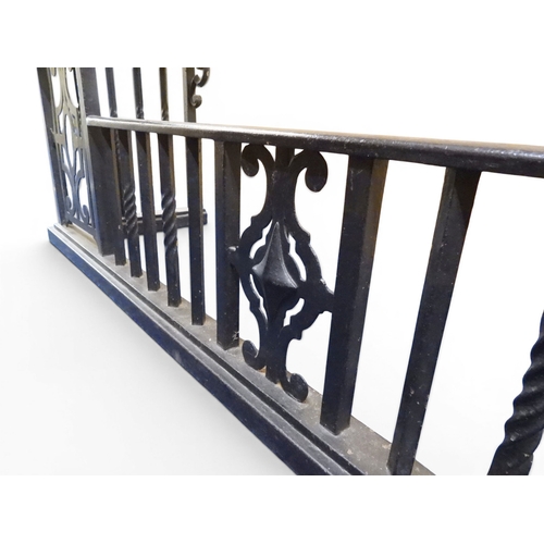 2056 - A LARGE 19TH CENTURY WROUGHT IRON CLUB FENDERwith oak topped seats to corners over twisted square ra... 