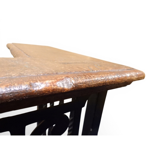 2056 - A LARGE 19TH CENTURY WROUGHT IRON CLUB FENDERwith oak topped seats to corners over twisted square ra... 