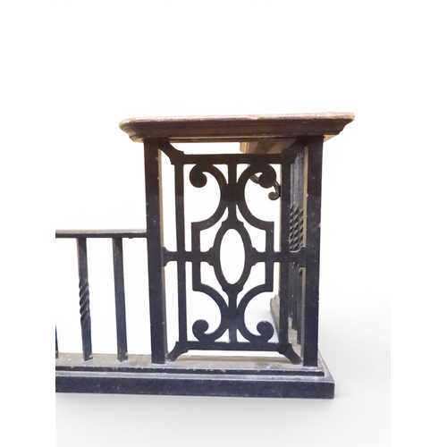 2056 - A LARGE 19TH CENTURY WROUGHT IRON CLUB FENDERwith oak topped seats to corners over twisted square ra... 