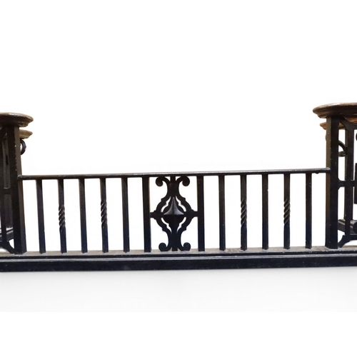 2056 - A LARGE 19TH CENTURY WROUGHT IRON CLUB FENDERwith oak topped seats to corners over twisted square ra... 