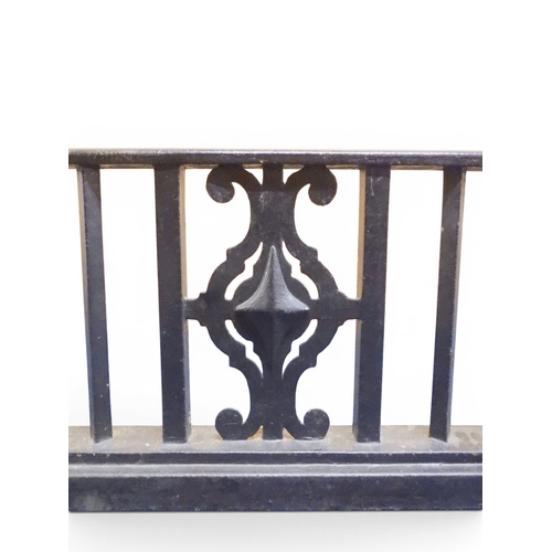 2056 - A LARGE 19TH CENTURY WROUGHT IRON CLUB FENDERwith oak topped seats to corners over twisted square ra... 