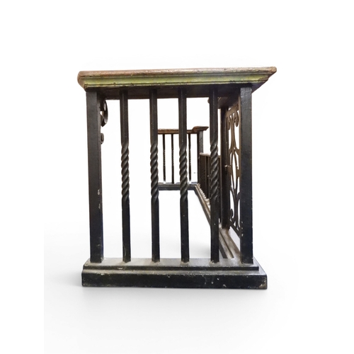 2056 - A LARGE 19TH CENTURY WROUGHT IRON CLUB FENDERwith oak topped seats to corners over twisted square ra... 