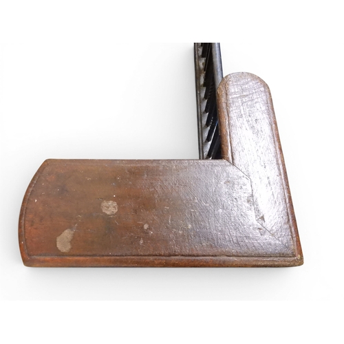 2056 - A LARGE 19TH CENTURY WROUGHT IRON CLUB FENDERwith oak topped seats to corners over twisted square ra... 