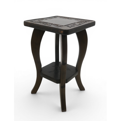 50A - An early 20th-century Arts and Crafts Japanese style carved lamp or occasional table, in the manner ...