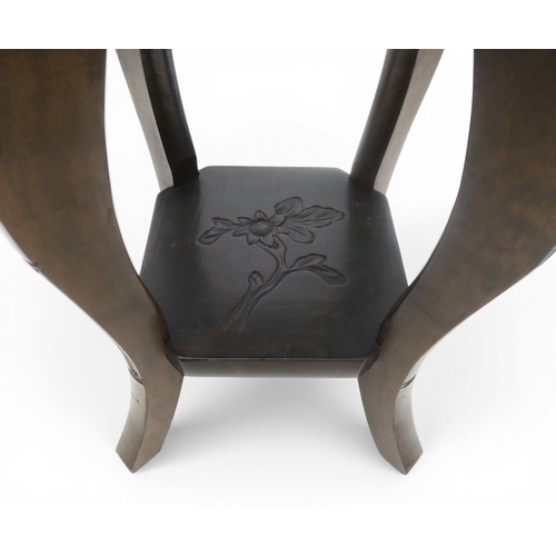 50A - An early 20th-century Arts and Crafts Japanese style carved lamp or occasional table, in the manner ...
