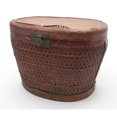 56A - A Chinese oval-shaped rattan wedding basket, with intricately woven lattice body, 19th century, 52 x...