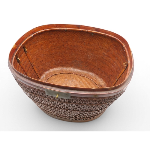 56A - A Chinese oval-shaped rattan wedding basket, with intricately woven lattice body, 19th century, 52 x...
