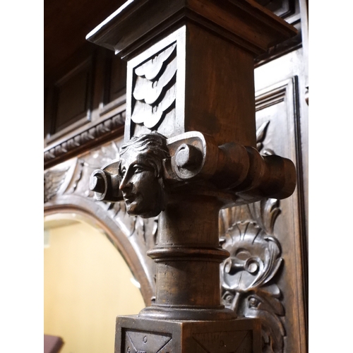 2028 - A LARGE LATE 19TH CENTURY CONTINENTAL OAK MIRROR BACK SIDEBOARDwith moulded projecting cornice on ca... 