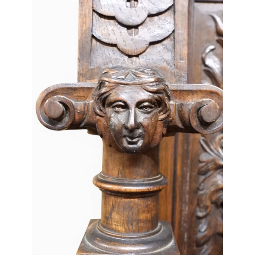 2028 - A LARGE LATE 19TH CENTURY CONTINENTAL OAK MIRROR BACK SIDEBOARDwith moulded projecting cornice on ca... 